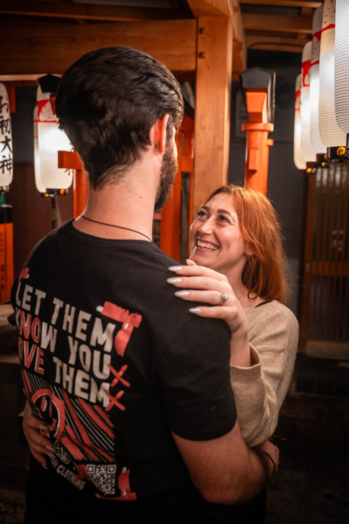 couple looking at each other at a temple in Osaka